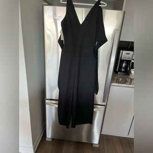 Black sleek aritzia jumpsuit that is slightly open at the back. Size 8/ medium